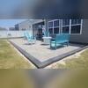 What a lovely addition this Porch and Patio makes to this familys property!